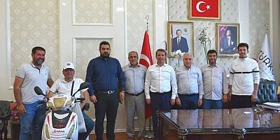 Türkoğlu Gençlerbirliğispor'dan başkan Okumuş'a ziyaret